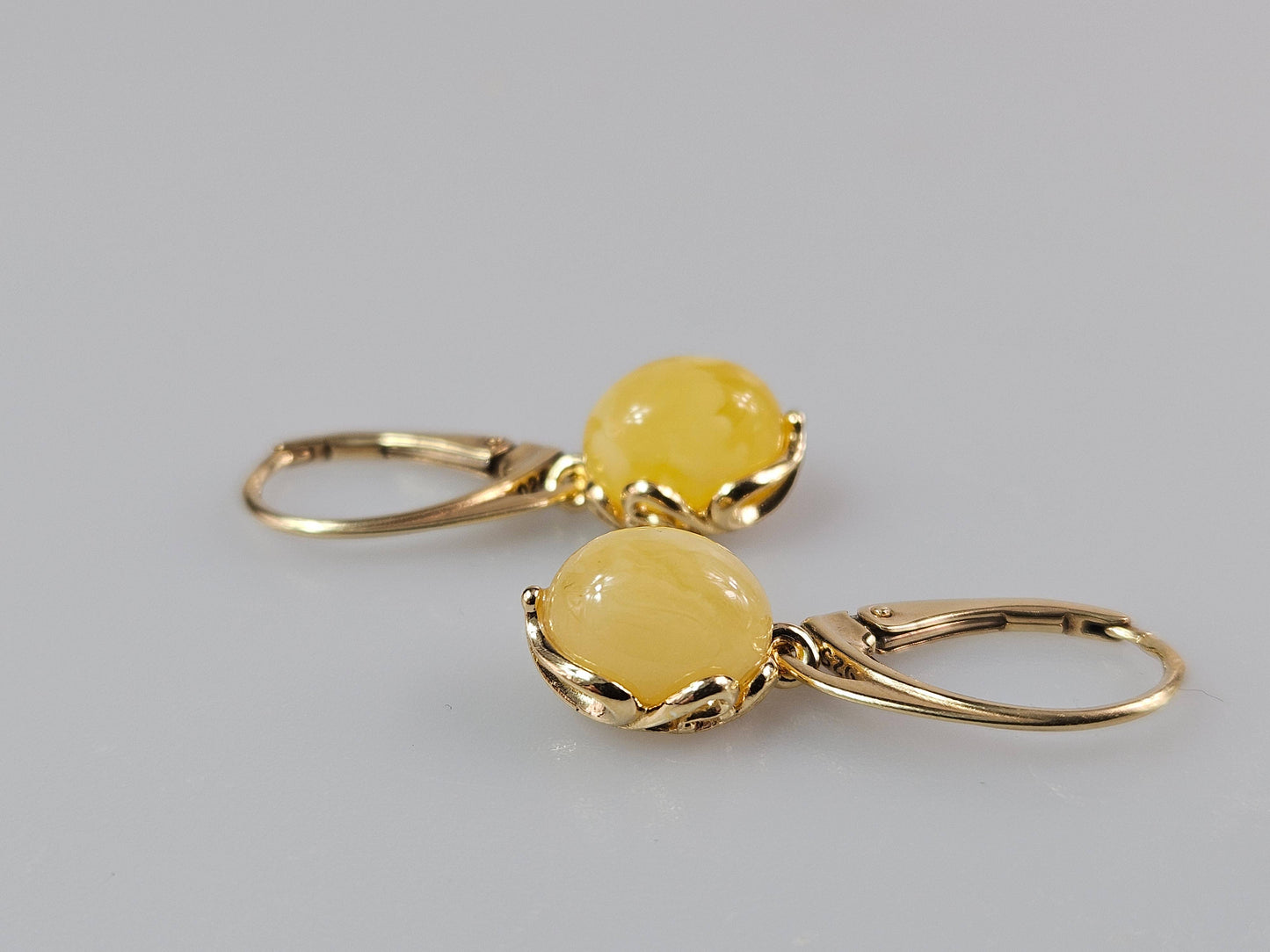 White Baltic amber earrings