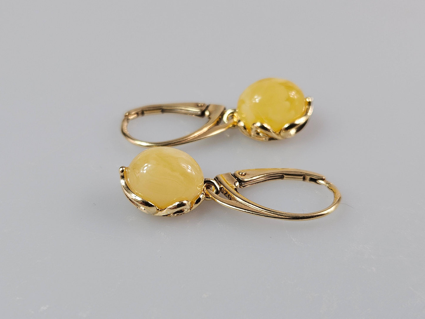 White Baltic amber earrings