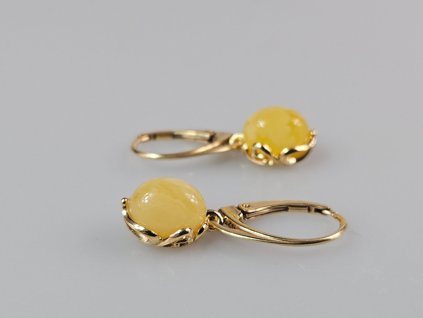 White Baltic amber earrings